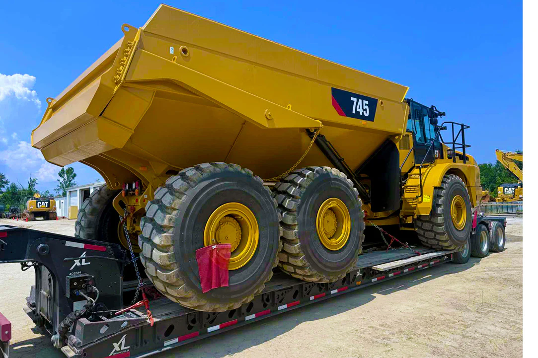 Heavy equipment transport in Pune for excavators and construction machinery