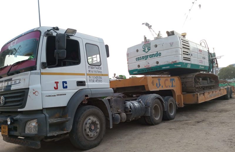Flatbed trailer transport in Pune for machinery and construction material